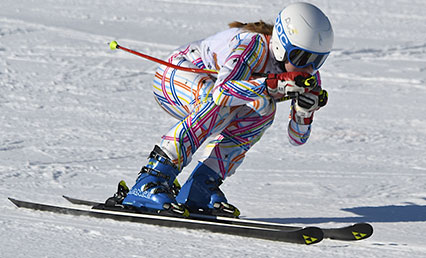 Girls Skiing Home