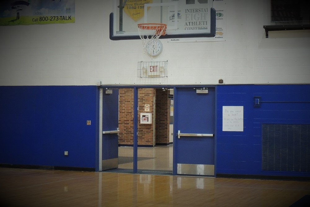 An AED, located just outside the doors to Hastings’ gymnasium, was used to save Da’Marion Hicks’ life June 14. 