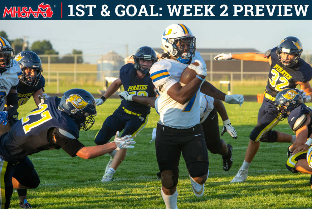 Redford Union’s Kyren Ware (7) breaks through the Pewamo-Westphalia defense during last week’s 26-6 victory that broke the Pirates’ 16-game winning streak.