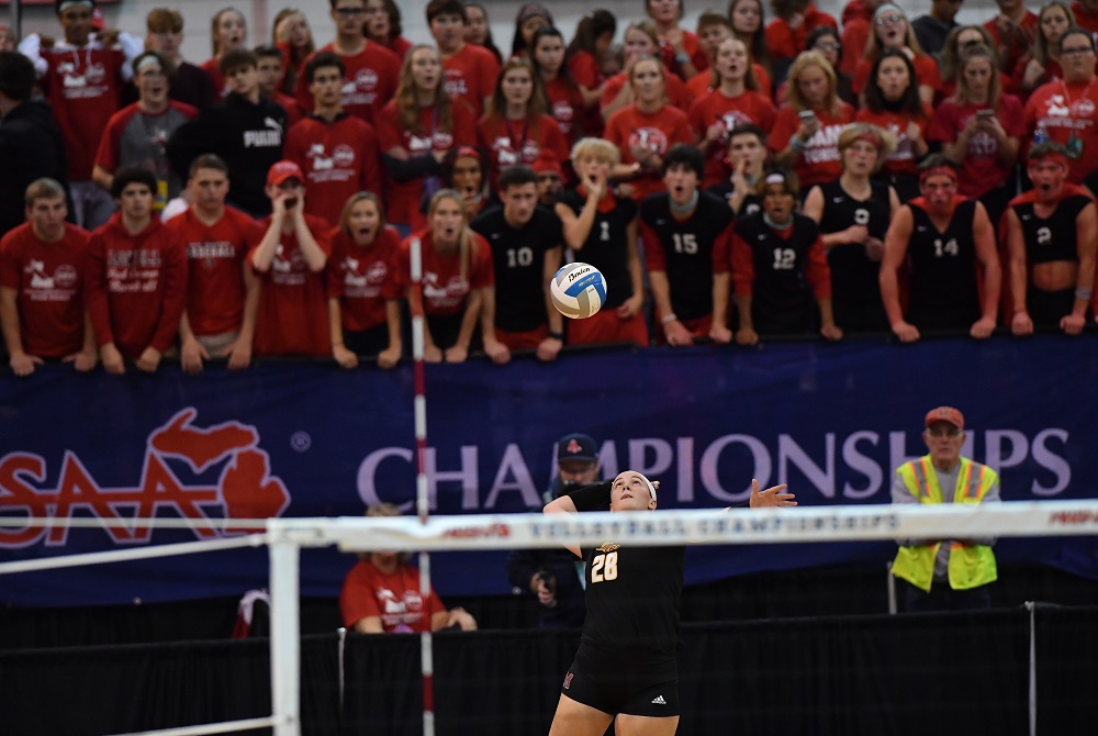 Farmington Hills Mercy serves against Lowell during the 2019 MHSAA Finals.