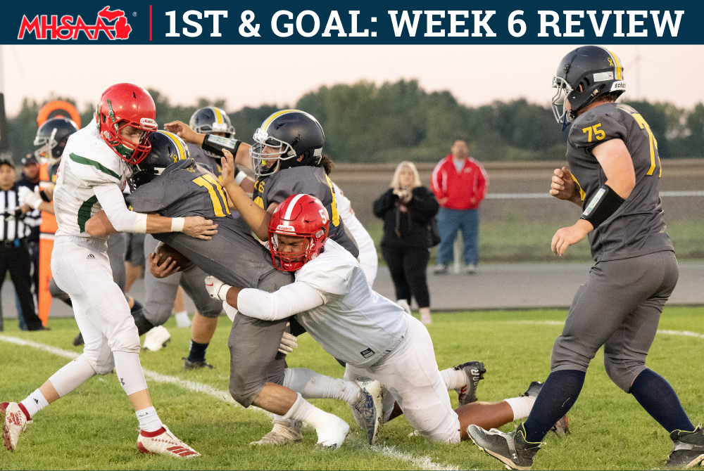 A Breckenridge ball carrier is pulled down by a Mount Pleasant Sacred Heart tackler during the Huskies’ 20-12 win on 9/30/22.