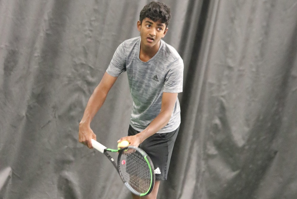 Northville’s Sachiv Kumar prepares to serve during a match his sophomore season.