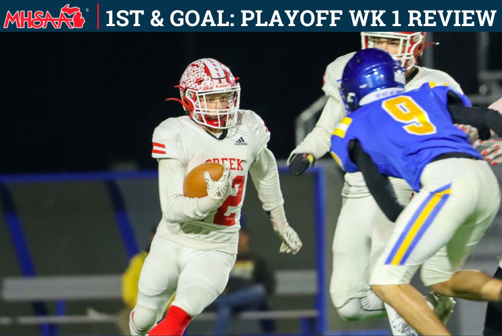 A Swartz Creek ball carrier looks for an opening during Friday’s playoff game against Midland.