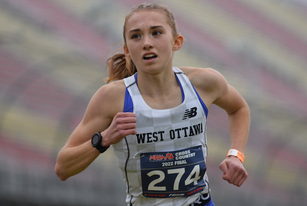 Holland West Ottawa’s Helen Sachs closes in on the finish and her first MHSAA Finals championship.