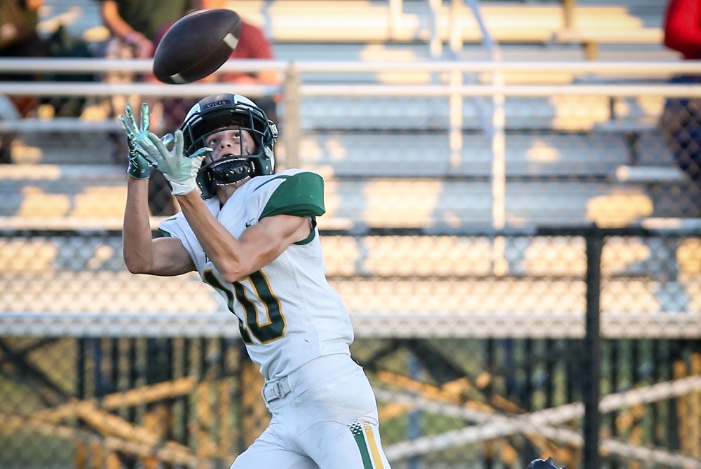 Flat Rock quarterback-turned-receiver Aaron Salazar hauls in a pass during a season that’s seem him gain nearly 1,000 yards through the air. 