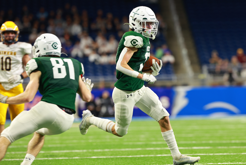 West Catholic’s Carter Perry (13) gets upfield during his team’s Division 6 championship win.