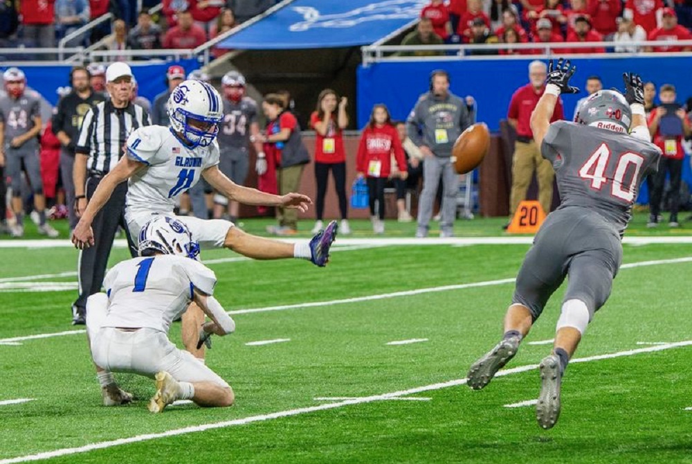 Gladwin's Treyton Siegert follows through on a kick during the Division 5 Final at Ford Field. 