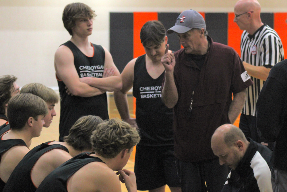 Cheboygan assistant boys basketball coach Scott Hancock offers some pointers during a scrimmage last week.