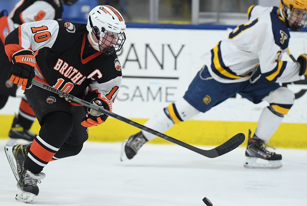 Brother Rice's Peter Rosa gains steam on a rush during last season's Division 2 Semifinal against Trenton at USA Hockey Arena. 