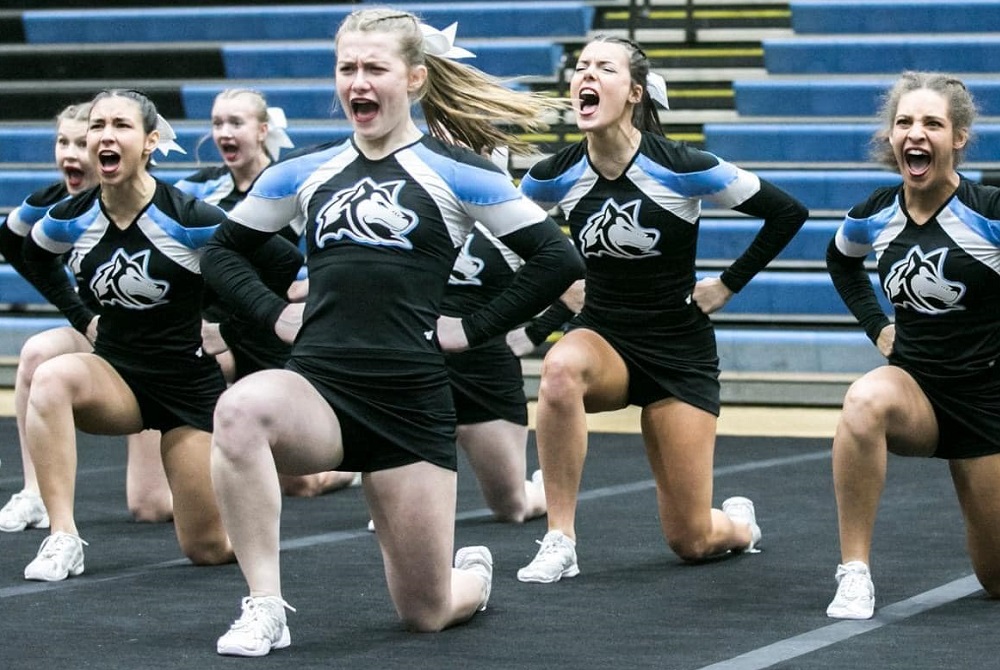 Forest Hills Northern competes during Saturday's District on its home mat.