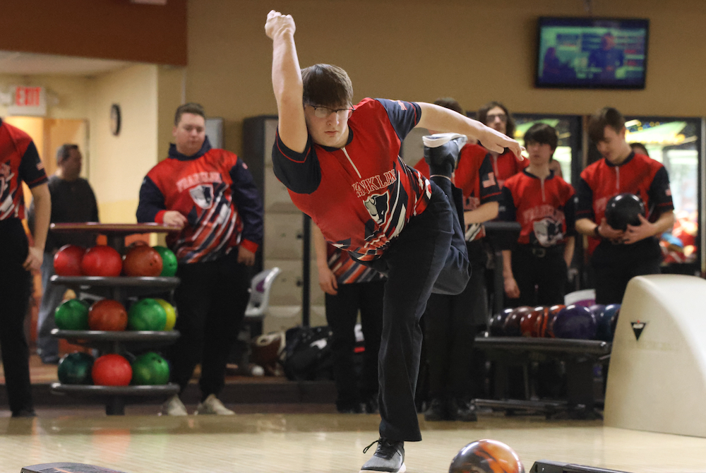 Livonia Franklin’s Sam White bowls during competition; he’s taken on a larger leadership role this season for the reigning Division 1 champion.