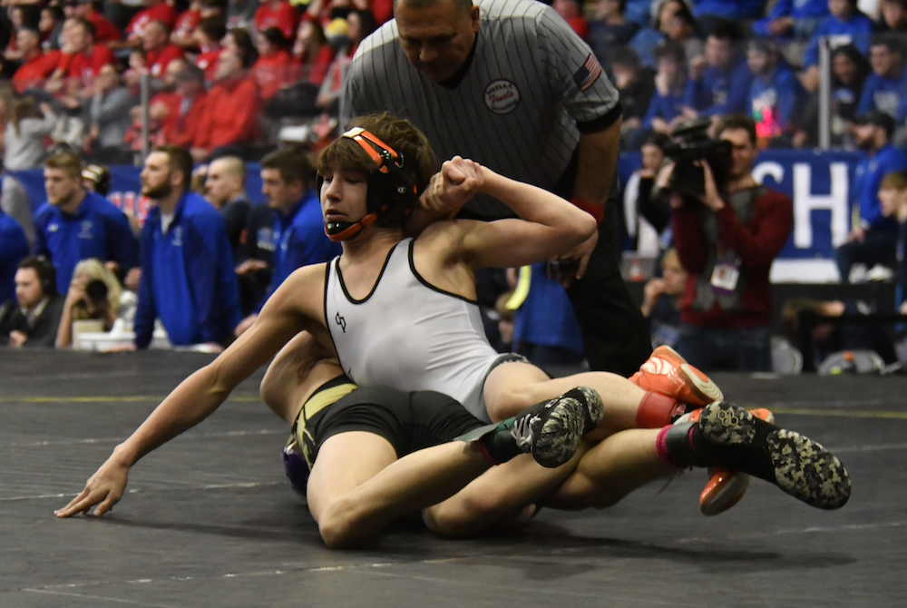 Hudson’s Nicholas Sorrow works toward a pin in his 113-pound match during the Division 4 Final. 