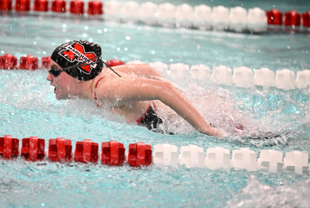 A Marquette racer swims the butterfly at the UP Finals. 