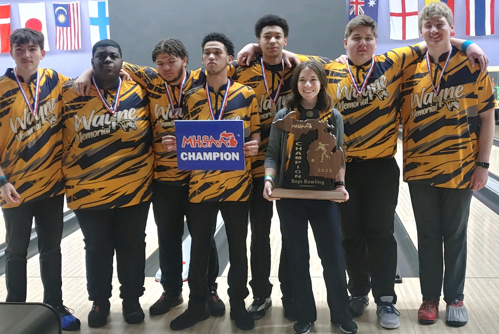 The Wayne Memorial boys bowling team celebrates its 2023 Division 1 title.