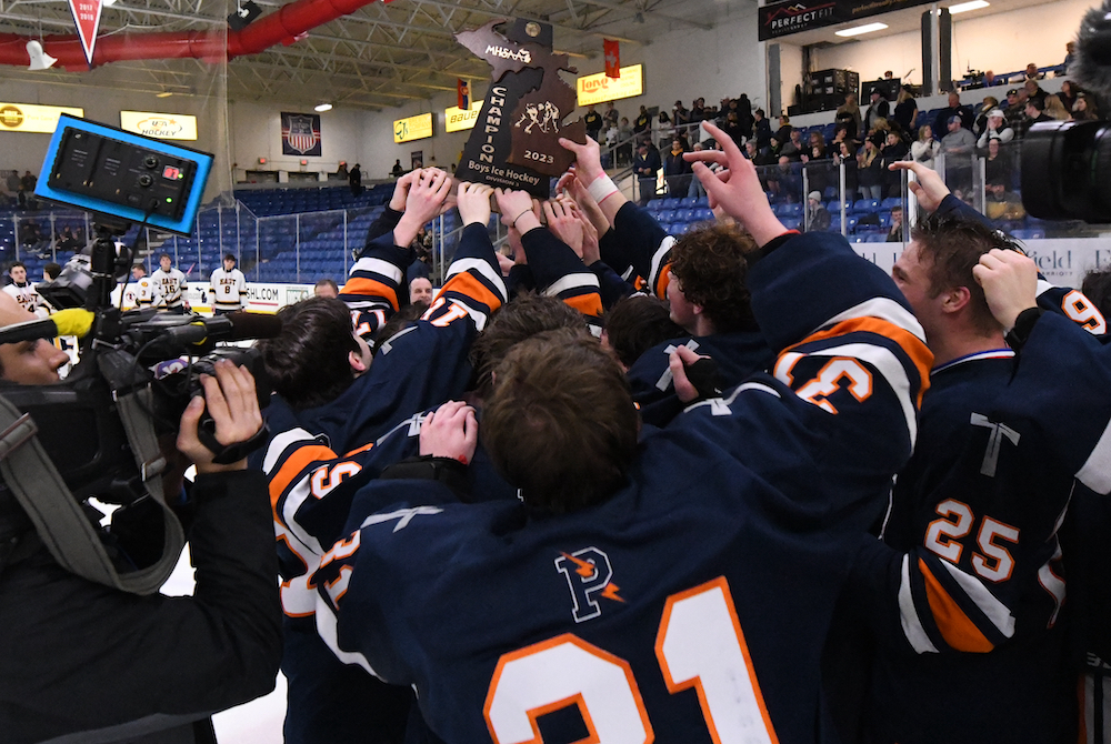 Flint Powers Catholic celebrates its first Finals championship Saturday at USA Hockey Arena. 