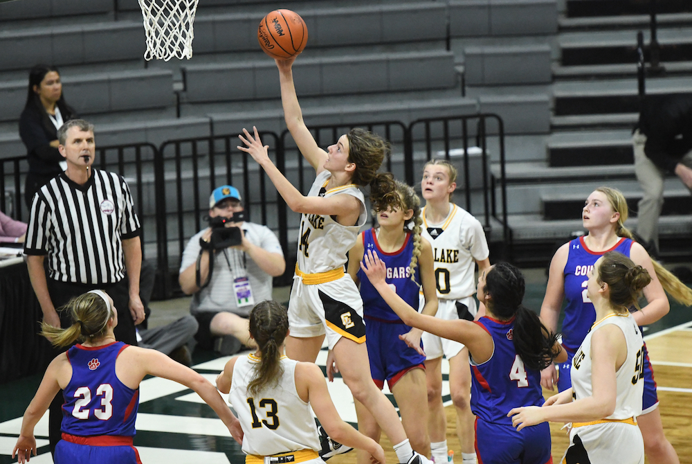 Glen Lake’s Jessie Pugh (14) gets through the lane and to the basket during Thursday’s second Division 4 Semifinal at Breslin Center. 