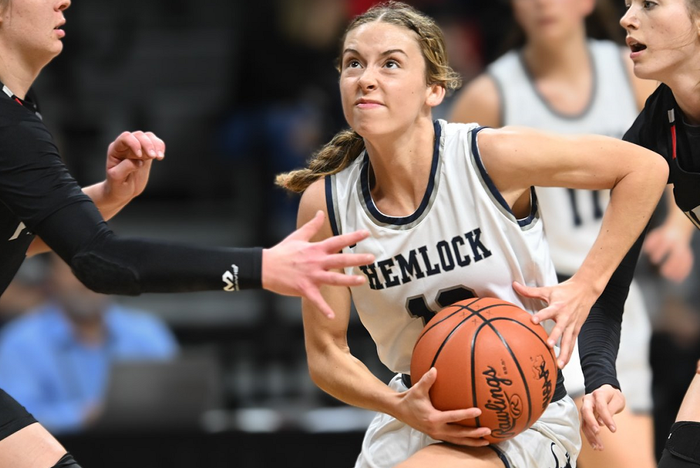 Hemlock's Regan Finkbeiner drives to the basket during her team's Semifinal win over Hart.