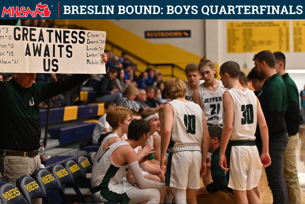 A fan holds up a sign supporting Painesdale Jeffers between the third and fourth quarters of last week’s Regional Final win over Stephenson.