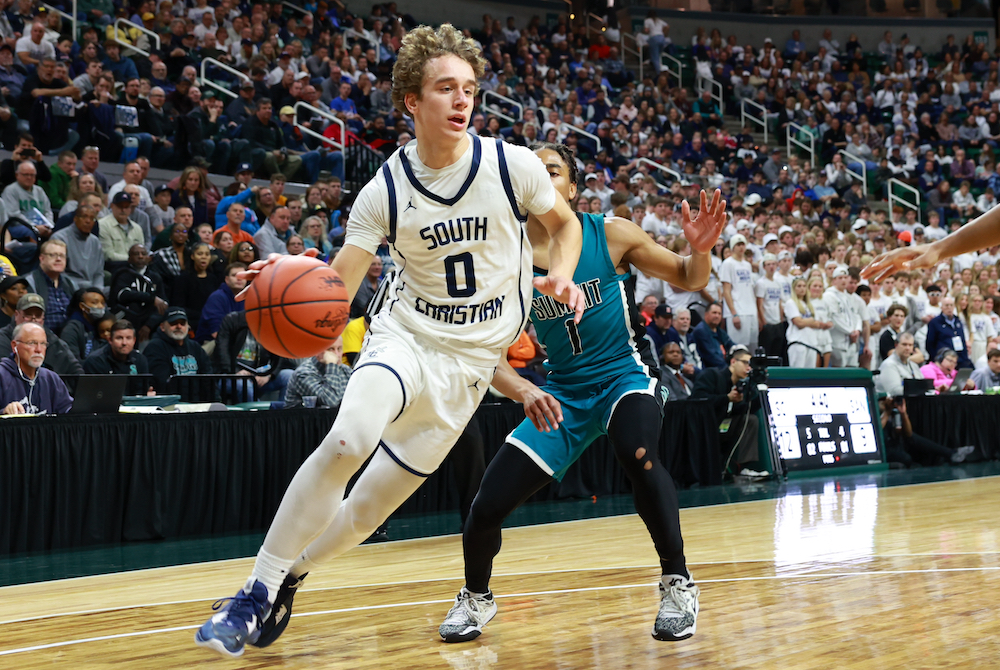 South Christian’s Jake Vermaas (0) makes a move toward the basket during his team’s Division 2 Semifinal win.