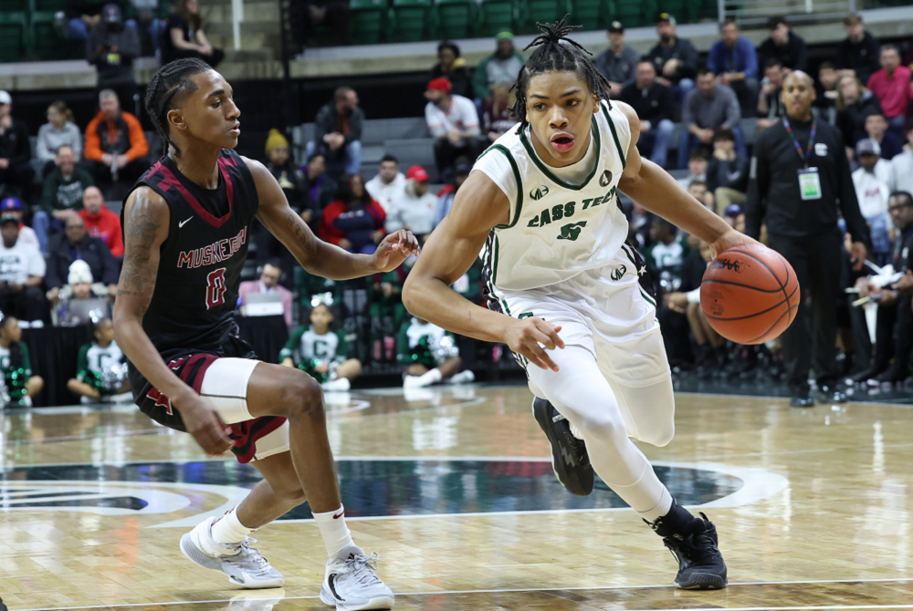 Detroit Cass Tech's Darius Acuff (5) makes his move into the lane during the Division 1 Final. 