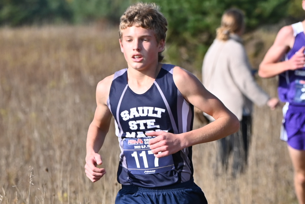 Sault Ste. Marie’s Gabe Litzner leads the Upper Peninsula Division 1 Cross Country Final in the fall.