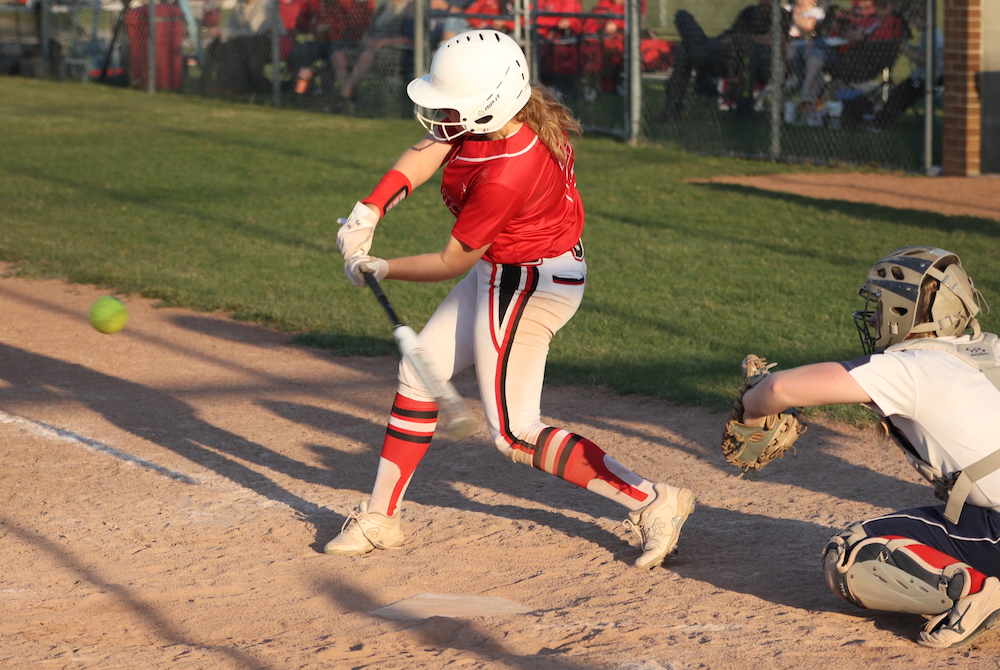 Millington's Lilly Damm prepares to drive a pitch.