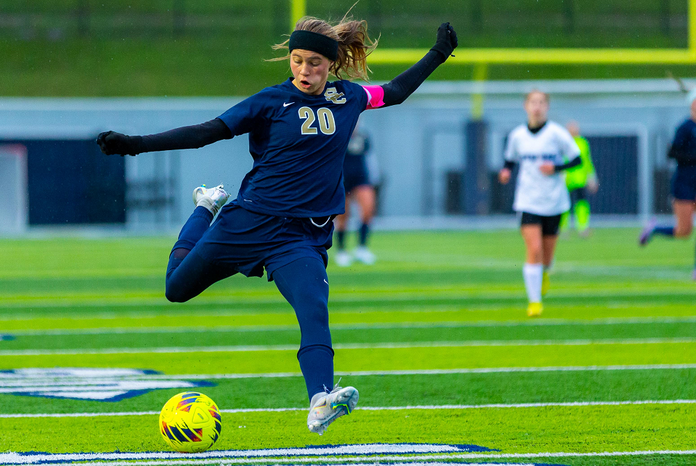 Stoney Creek's Lilley Bosley winds up during her team's May 2 game against Royal Oak.