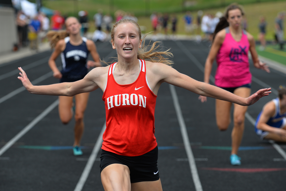 New Boston Huron's Elizabeth Anderson clears the finish line during last season's LPD2 400 race.