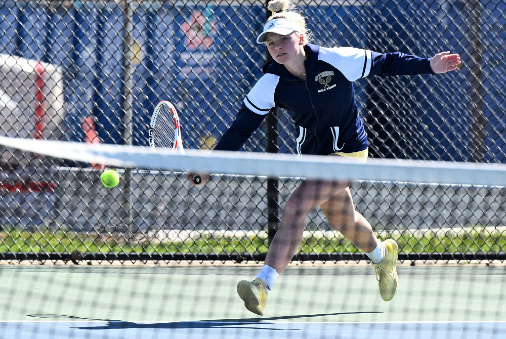 Otsego’s Aly Aldrich returns a volley during a match day this spring. 