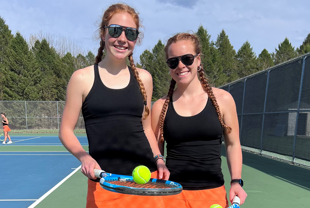 Elk Rapids sisters Brynne (left) and Jaida Schulte have teamed up at No. 3 doubles for the tennis team this season.