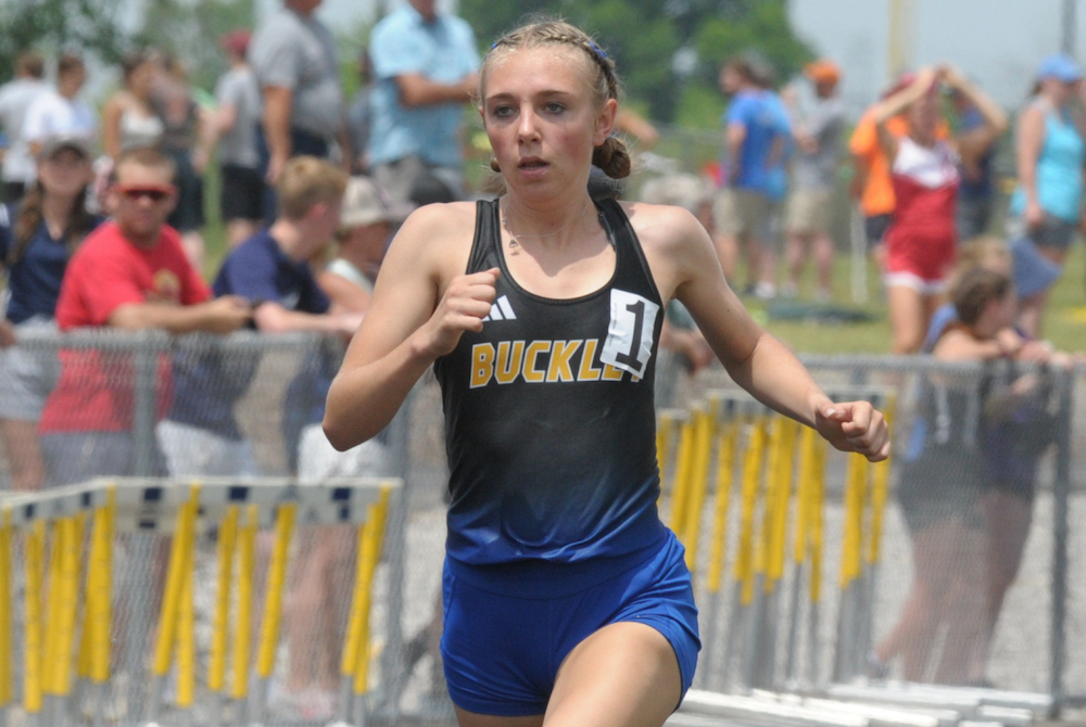 Buckley's Aiden Harrand sets the pace in the 1,600 on Saturday.
