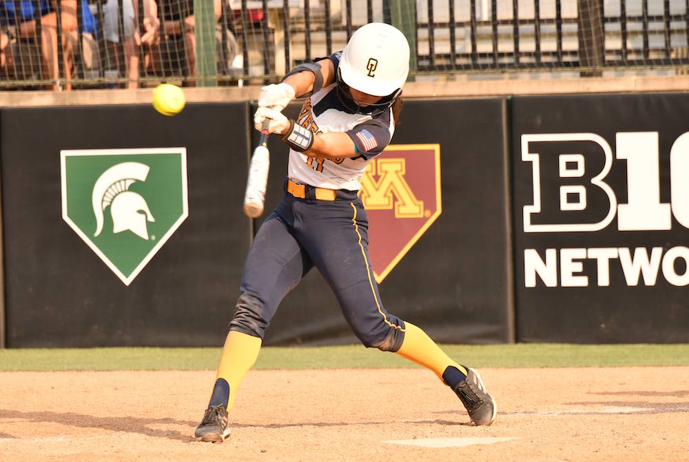 Whiteford's Alyssa VanBrandt cranks a pitch during her team's Semifinal win Friday.