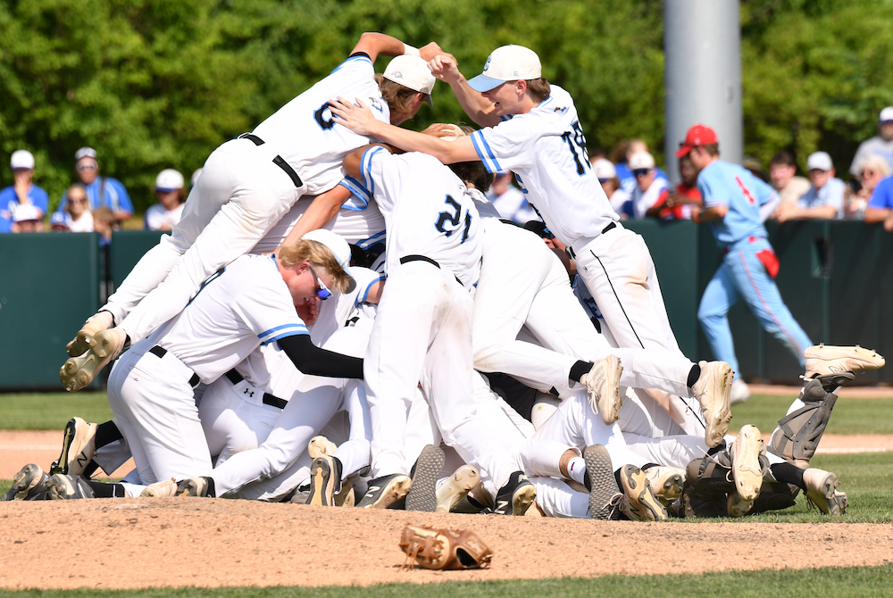 Grand Rapids Christian players celebrate their Division 2 championship Saturday at McLane Stadium. 