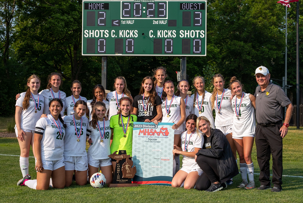 Grosse Pointe North celebrates its Division 2 championship.