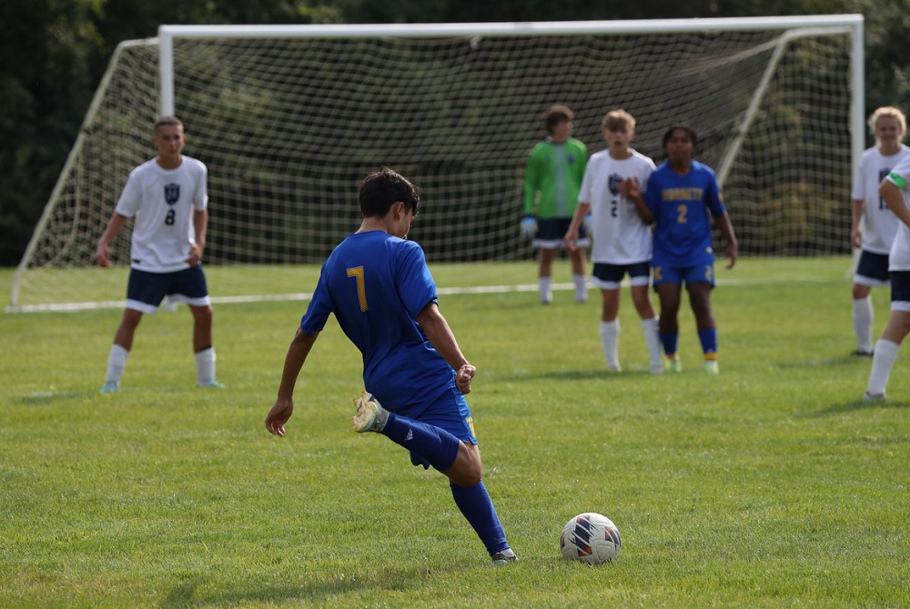 Kearsley’s Carlos Granados (7) steps into a kick during a game against Durand on Aug 21.