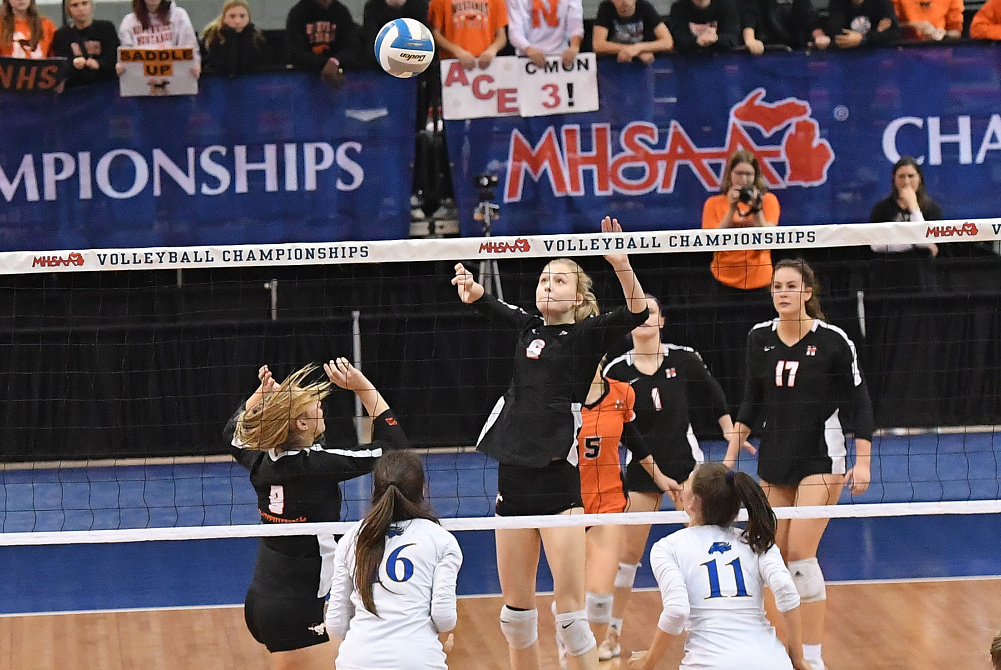 Northville’s Avry Nelson (6) winds up for a kill attempt during last season’s Division 1 Final against Bloomfield Hills Marian.