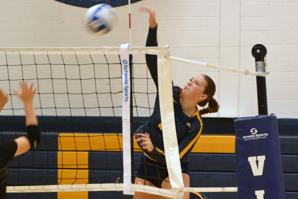 Cadillac's McKenzie Johns unloads on an attempt during a match. 