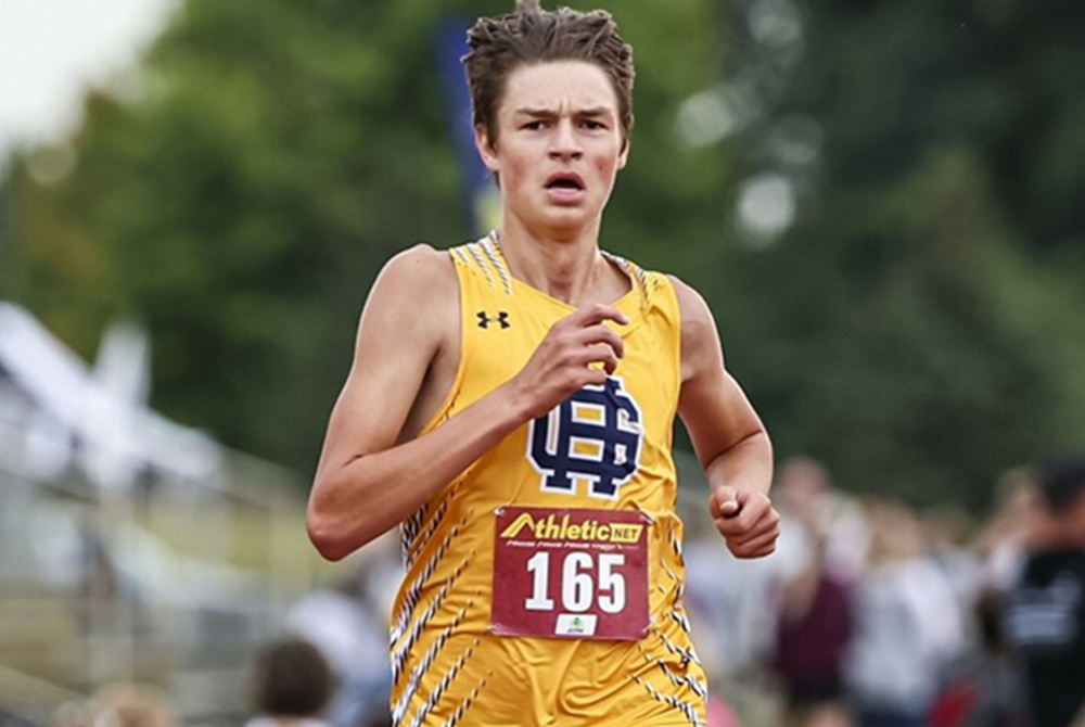 Grand Haven's Seth Norder charges toward the finish.