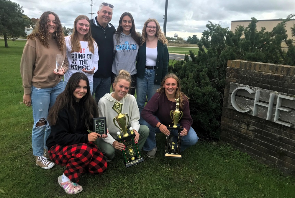 Cheboygan shows off the hardware the team earned this season. Back row, from left: Emily Clark, Ella Kosanke, Coach Sean McNiel, Emerson Eustice and Taten Lake. Front row, from left: Gabrielle Melonas, Katie Maybank and Elise Markham.