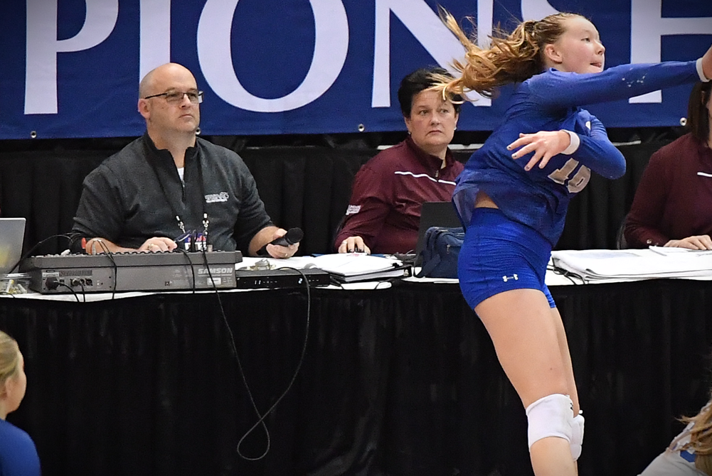 Tony Coggins serves as PA announcer during a 2022 Division 3 volleyball match at Kellogg Arena.