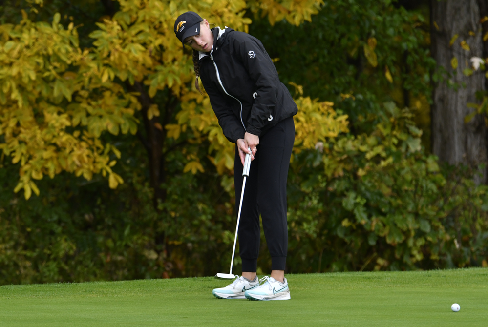 Lauren Timpf putts during the first round of the 2023 Lower Peninsula Division 3 Girls Golf Final.