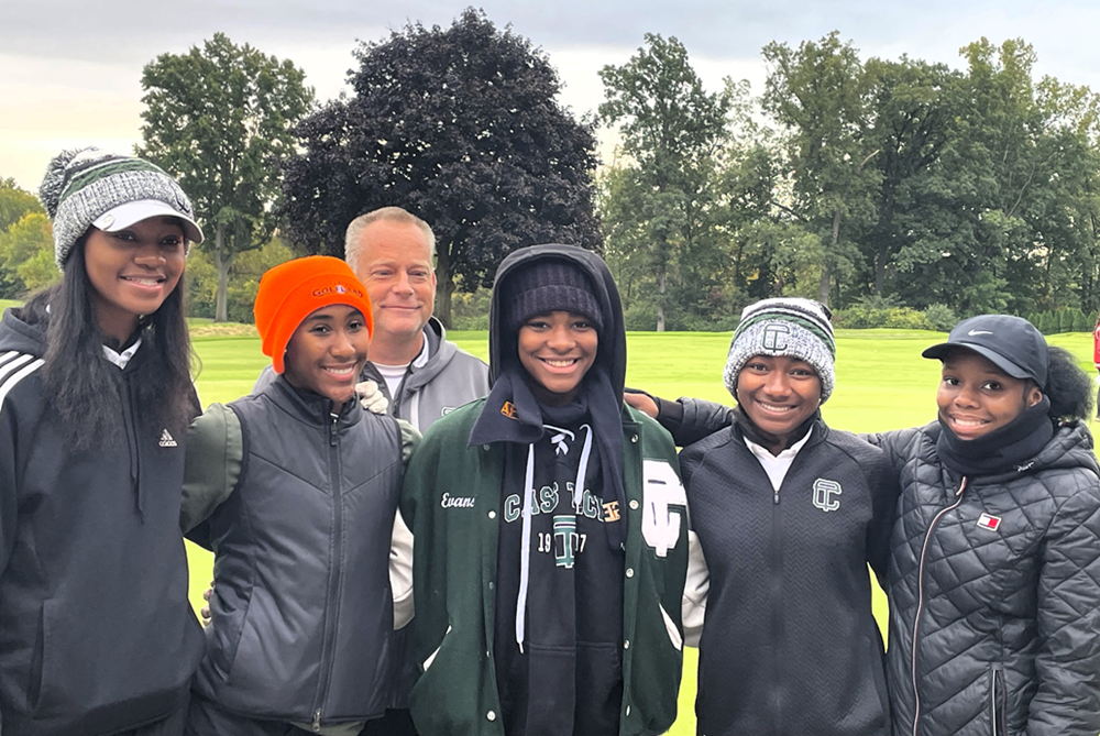 The Detroit Cass Tech girls golf team celebrates qualifying for the MHSAA Final from its LPD1 Regional.