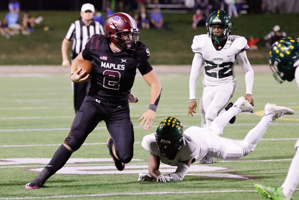 Birmingham Seaholm's Colton Kinnie eludes a Groves defender.