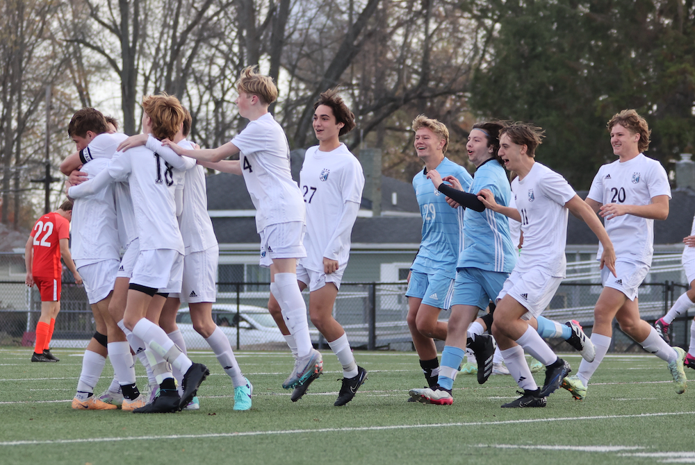 Grand Rapids Christian celebrates during Saturday’s Division 2 Final at Grand Ledge. 