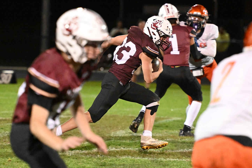 Martin's Haylen Buell charges into an opening during his team's win over Gobles.