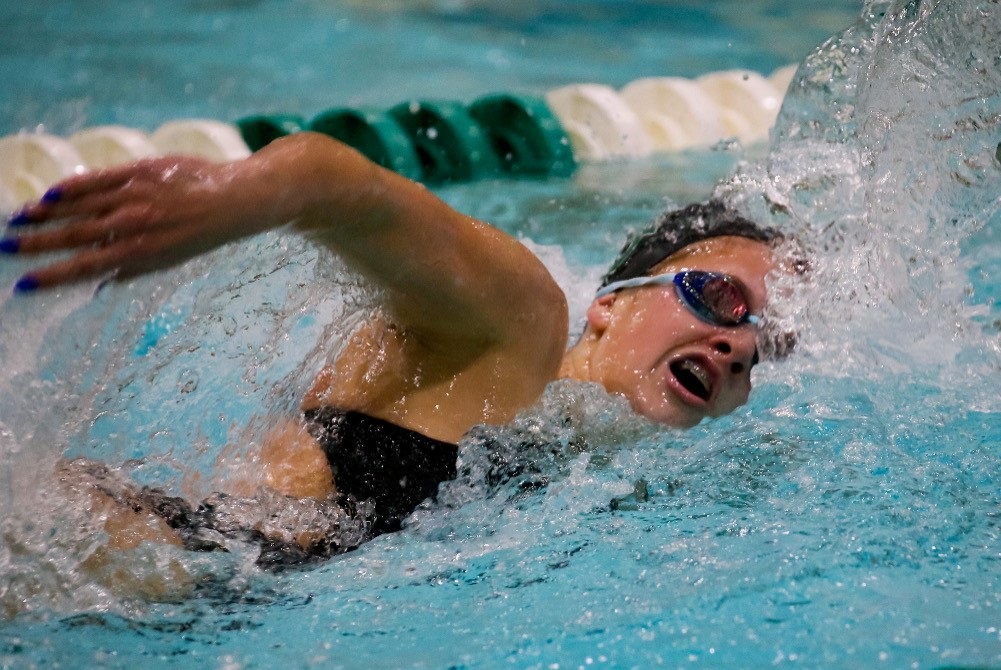 Wayland’s Laney Wolf swims one of her races; she’s among the state’s elite sprinters.