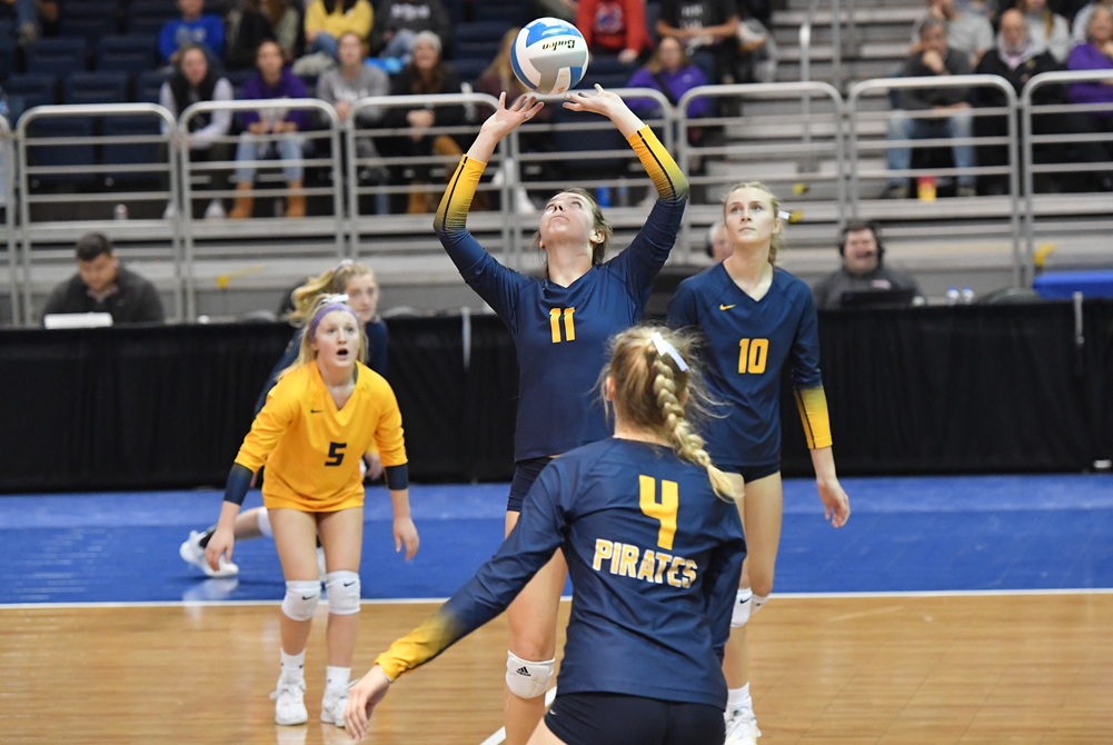 Taylor Smith (11) sets to her teammates during Pewamo-Westphalia’s 2022 Division 3 championship win at Kellogg Arena.