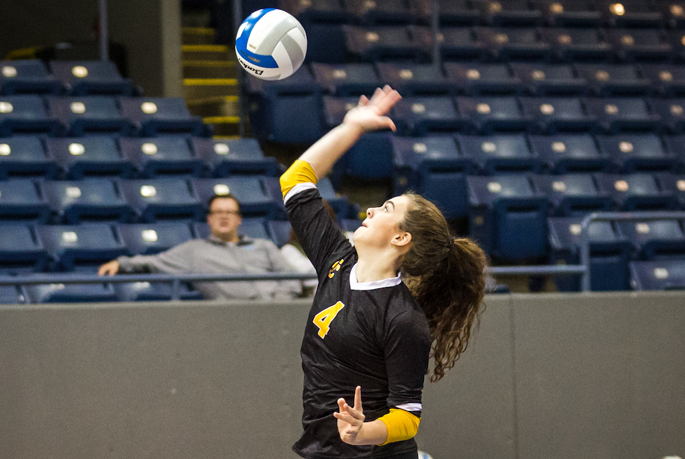Clarkston Everest Collegiate's Sarah Bradley serves during Finals weekend at Kellogg Arena.