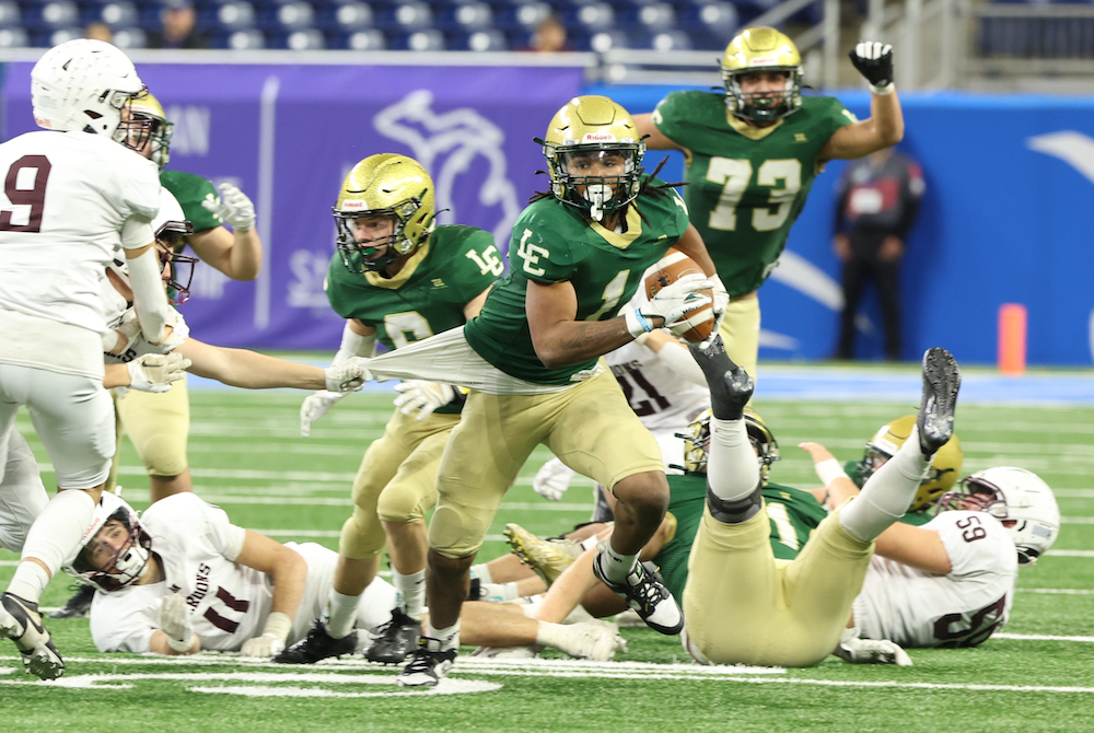 Kadale Williams (1) pulls aways from a defender during Jackson Lumen Christi’s Division 7 win Saturday morning.