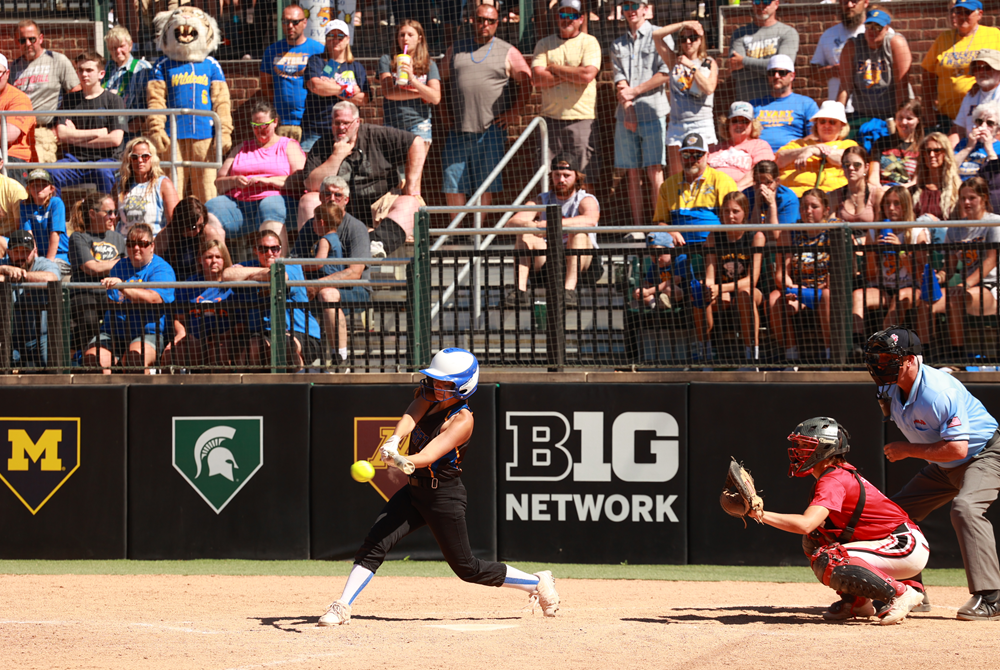 Evart's Riley Brigham connects during her team's Division 3 Final against Millington in 2022.